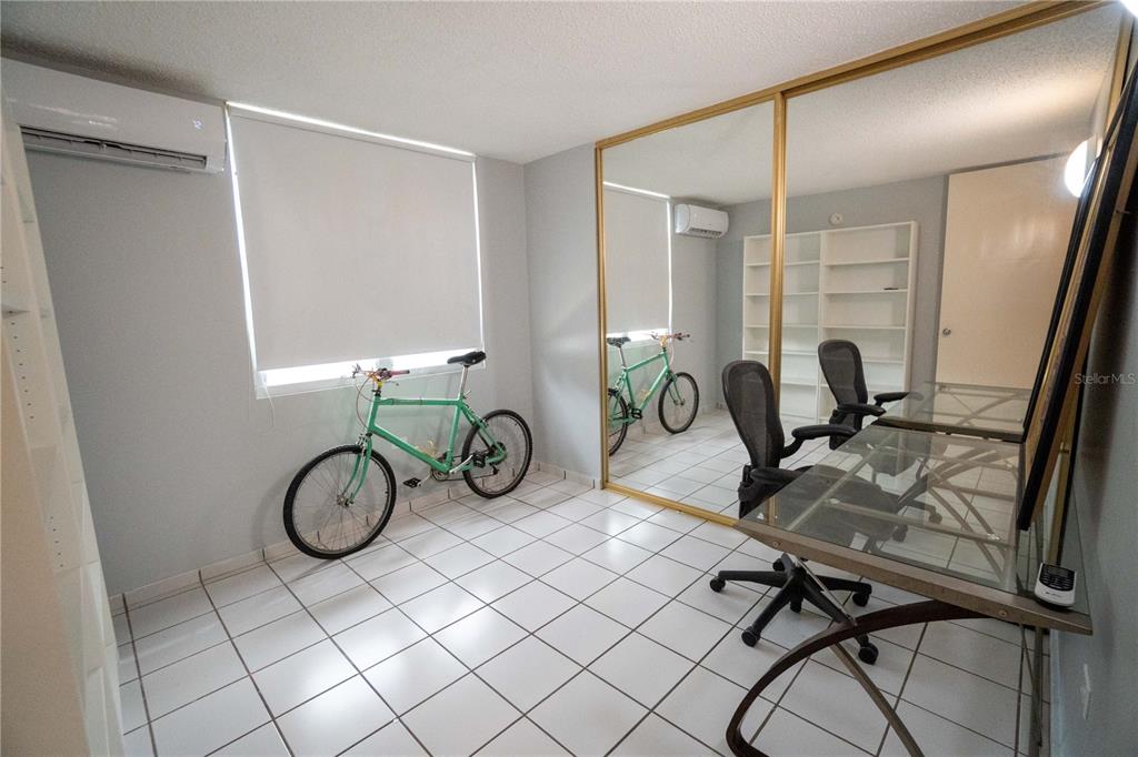 Cond Caparra Chalets Cond Caparra Chalets 8th, Unit 2A1 Guaynabo, PR 00966 - Photo 13 of 25 a view of a room with gym equipment