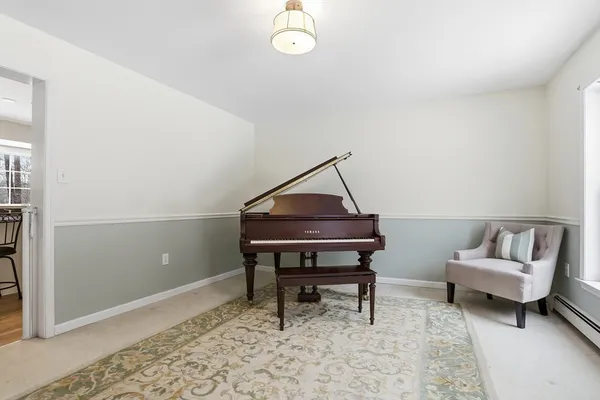 a living room with a couch and a table