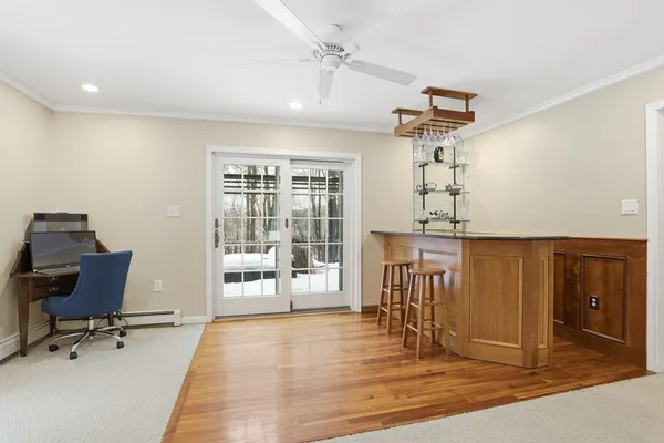 a view of a livingroom with a furniture and a window