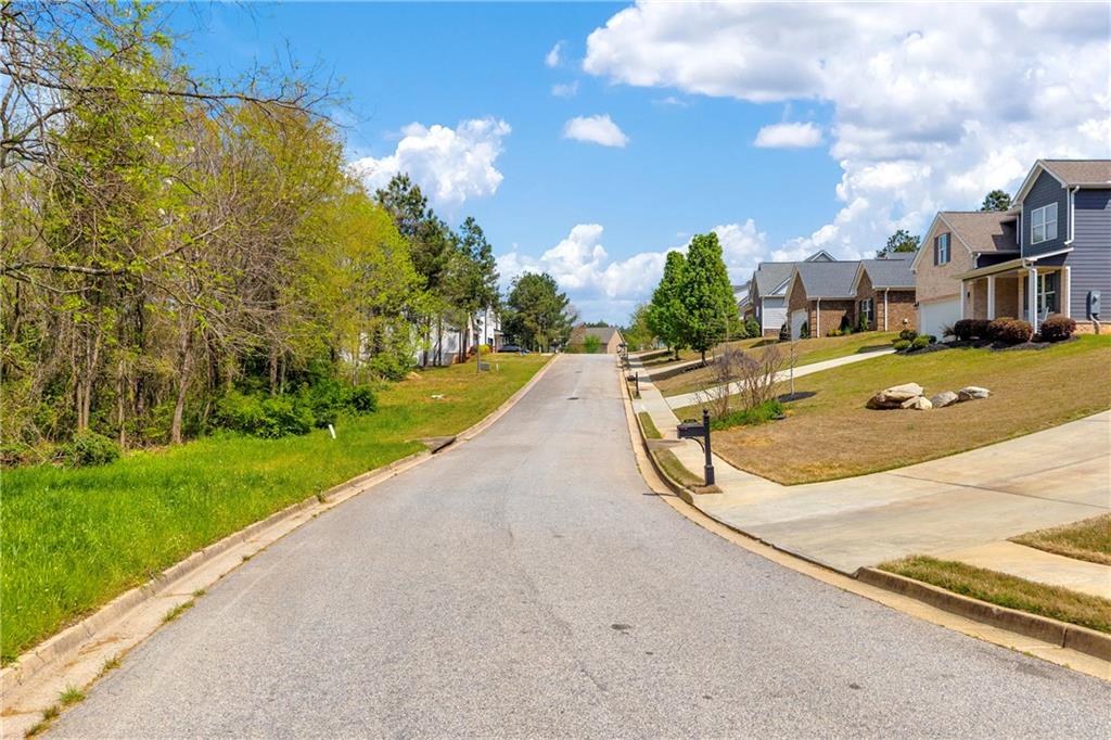 9131 Golfview Lane Covington, GA 30014 - Photo 14 of 19 a view of a house with a yard