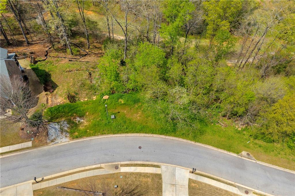 9131 Golfview Lane Covington, GA 30014 - Photo 15 of 19 a view of a swimming pool with a yard