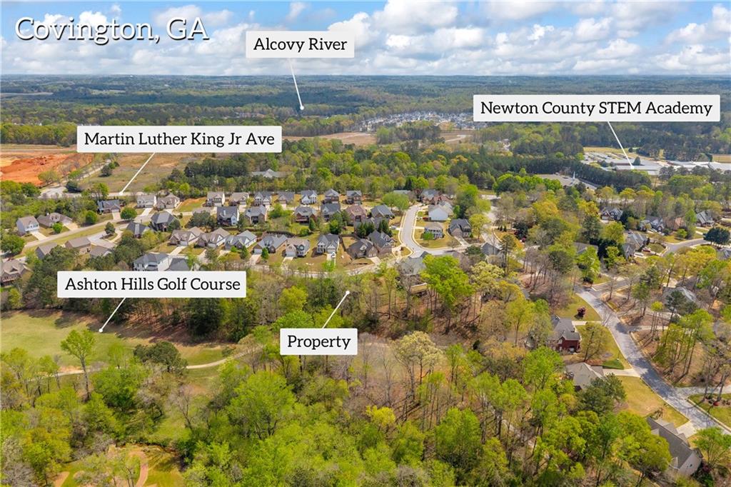 9131 Golfview Lane Covington, GA 30014 - Photo 8 of 19 a sign broad