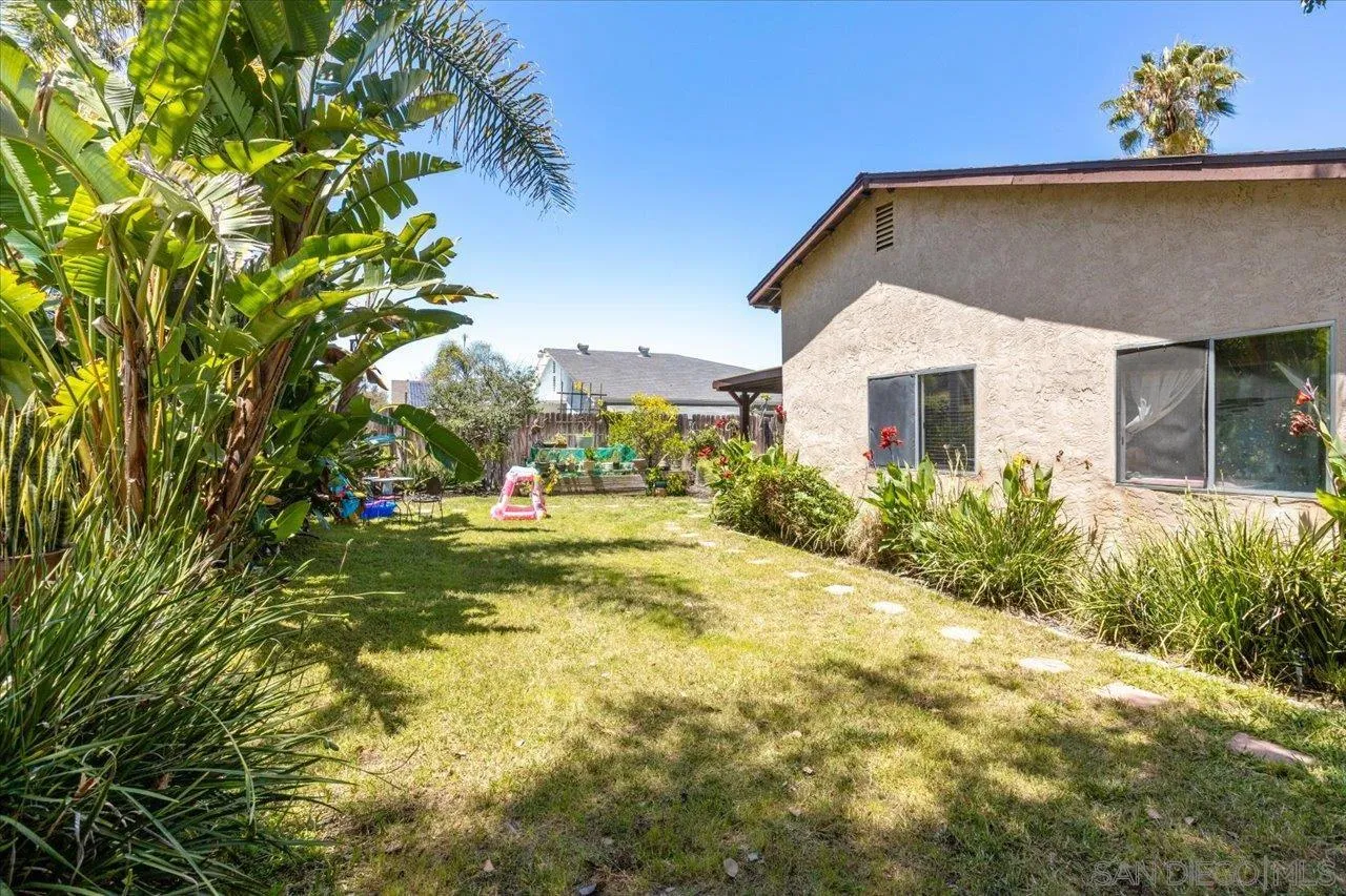2337 Fallingleaf Road Oceanside, CA 92056 - Photo 5 of 34 a view of a house with a yard