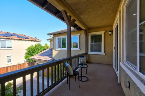 a view of a porch with furniture