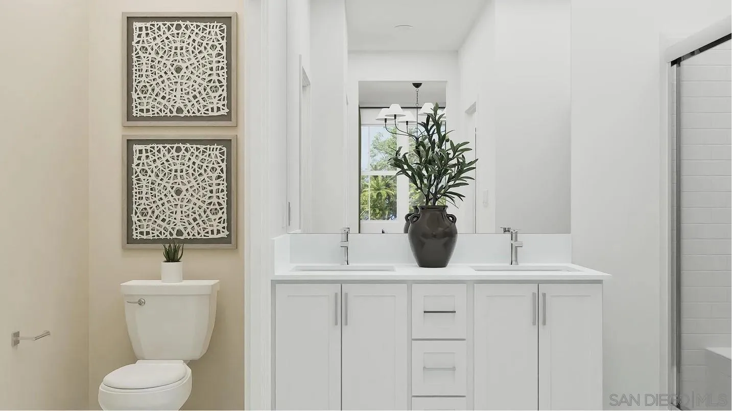 1702 Jacob Court El Cajon, CA 92021 - Photo 13 of 15 a bathroom with a toilet a sink and a window
