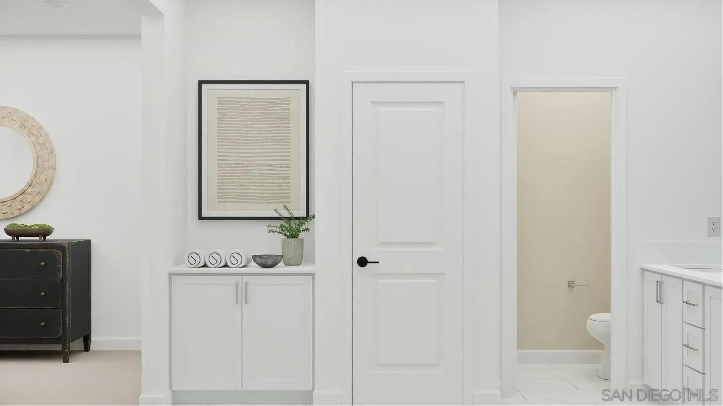 1702 Jacob Court El Cajon, CA 92021 - Photo 14 of 15 a bathroom with a sink and a mirror