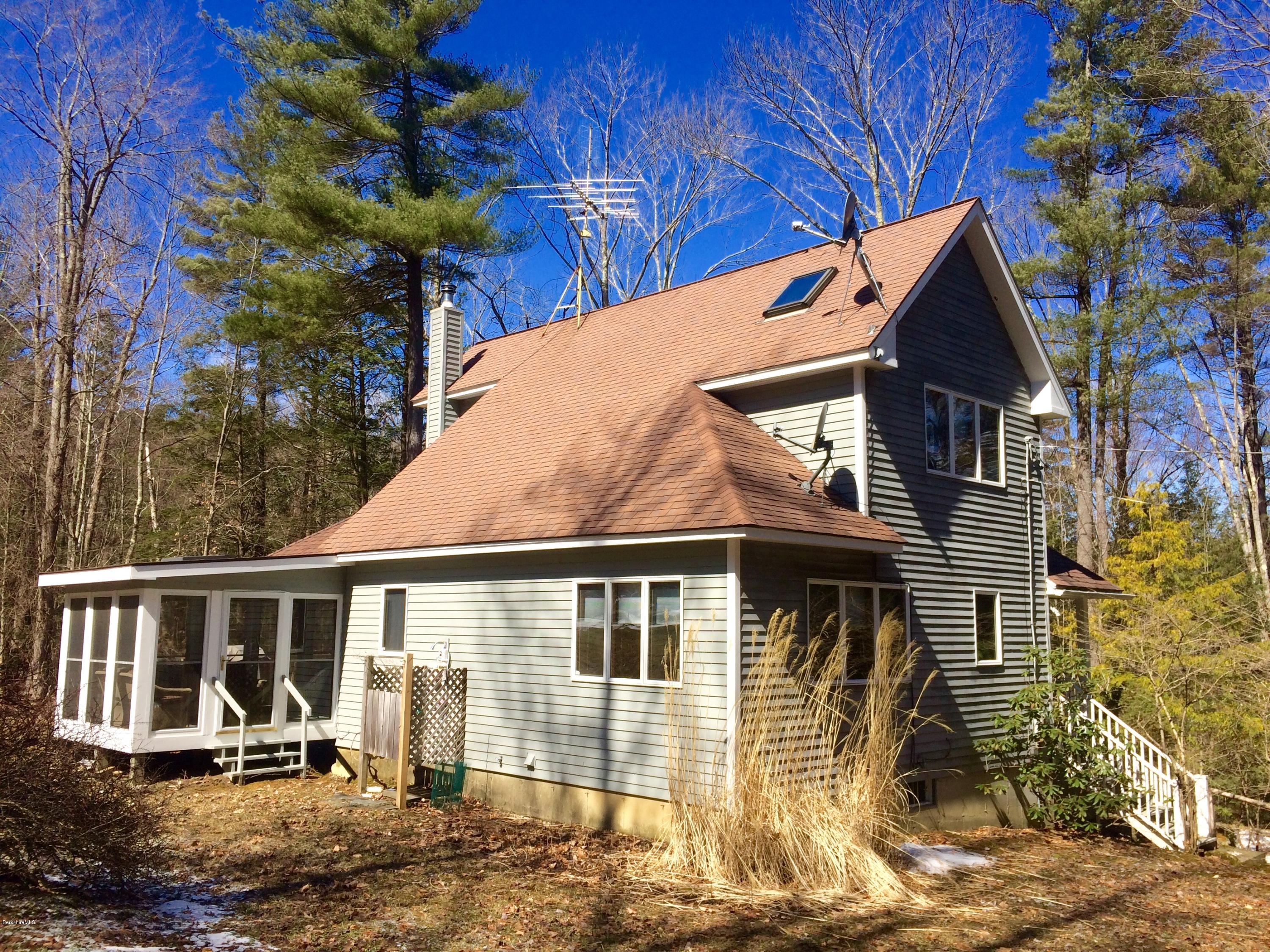64 Monterey Road Tyringham, MA 01264 - Photo 24 of 26 a view of a house with a yard