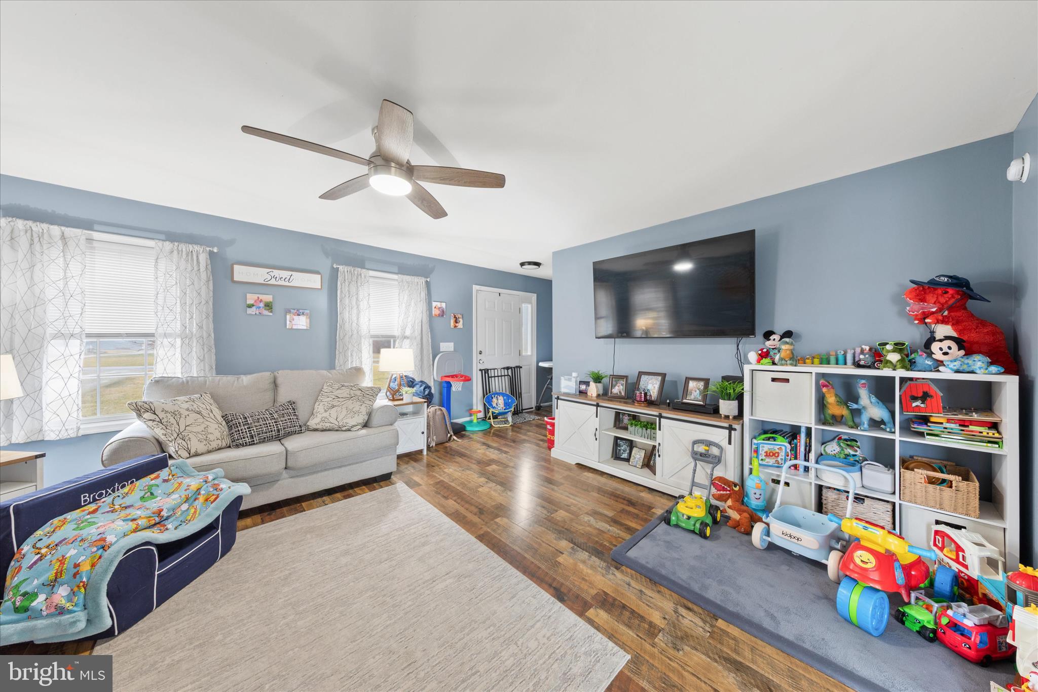 1807 Price Station Road Church Hill, MD 21623 - Photo 11 of 48 a living room with furniture and a flat screen tv