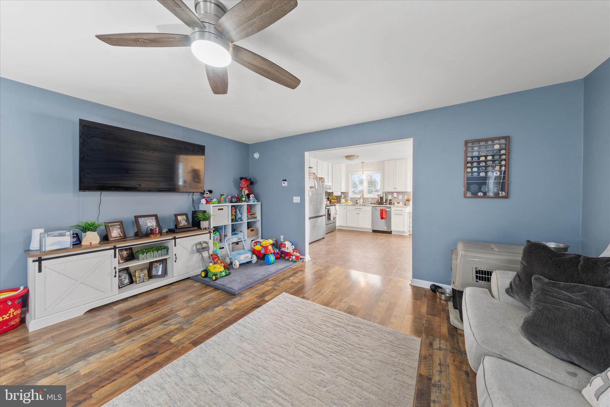 1807 Price Station Road Church Hill, MD 21623 - Photo 12 of 48 a living room with furniture and a flat screen tv