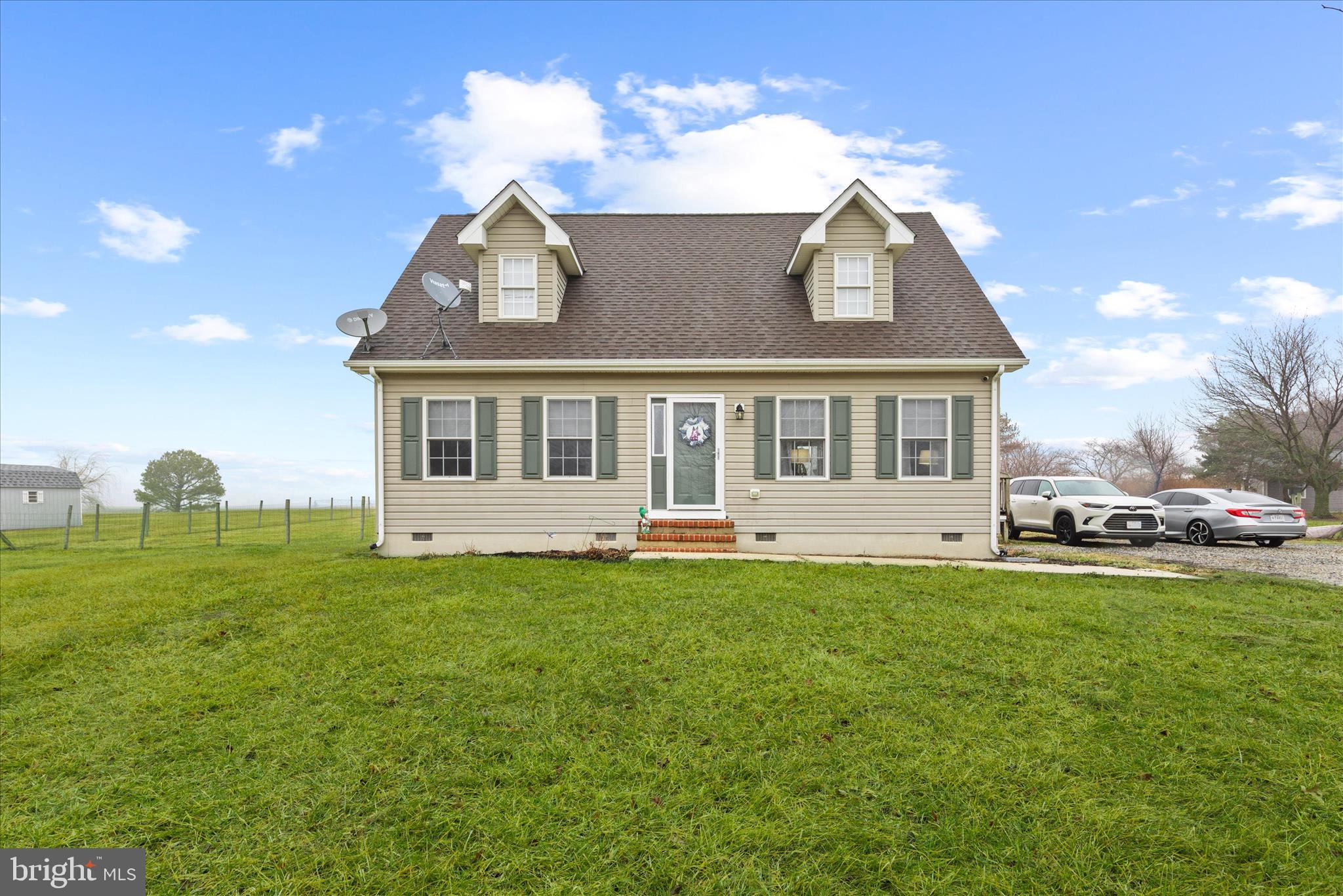 1807 Price Station Road Church Hill, MD 21623 - Photo 2 of 48 a front view of a house with a yard