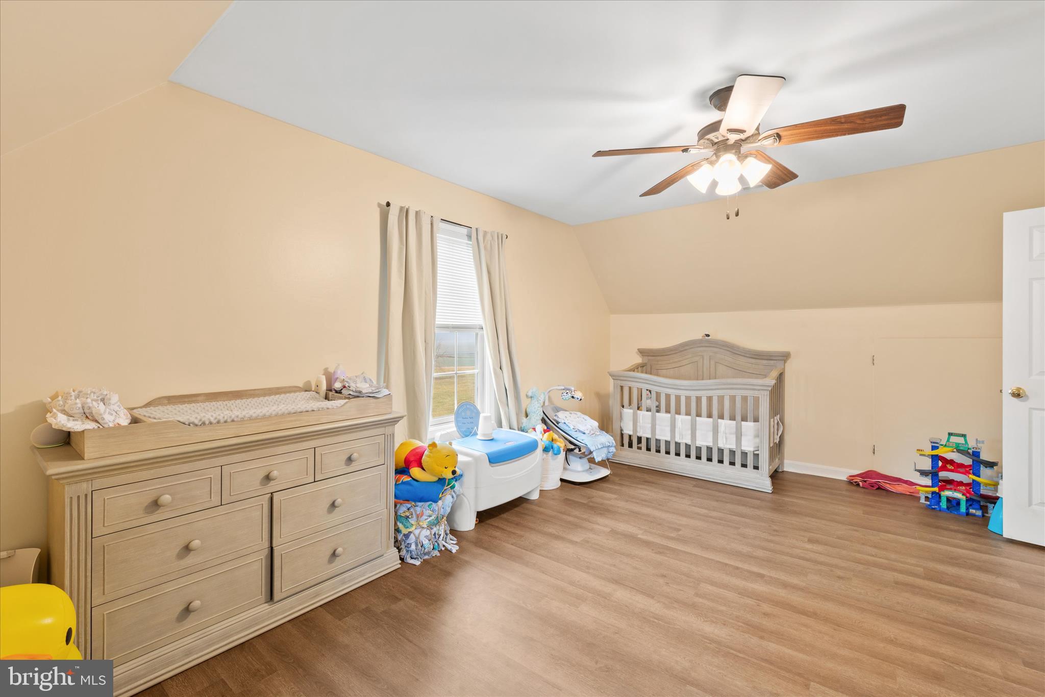 1807 Price Station Road Church Hill, MD 21623 - Photo 23 of 48 a bedroom with a bed and wooden floor