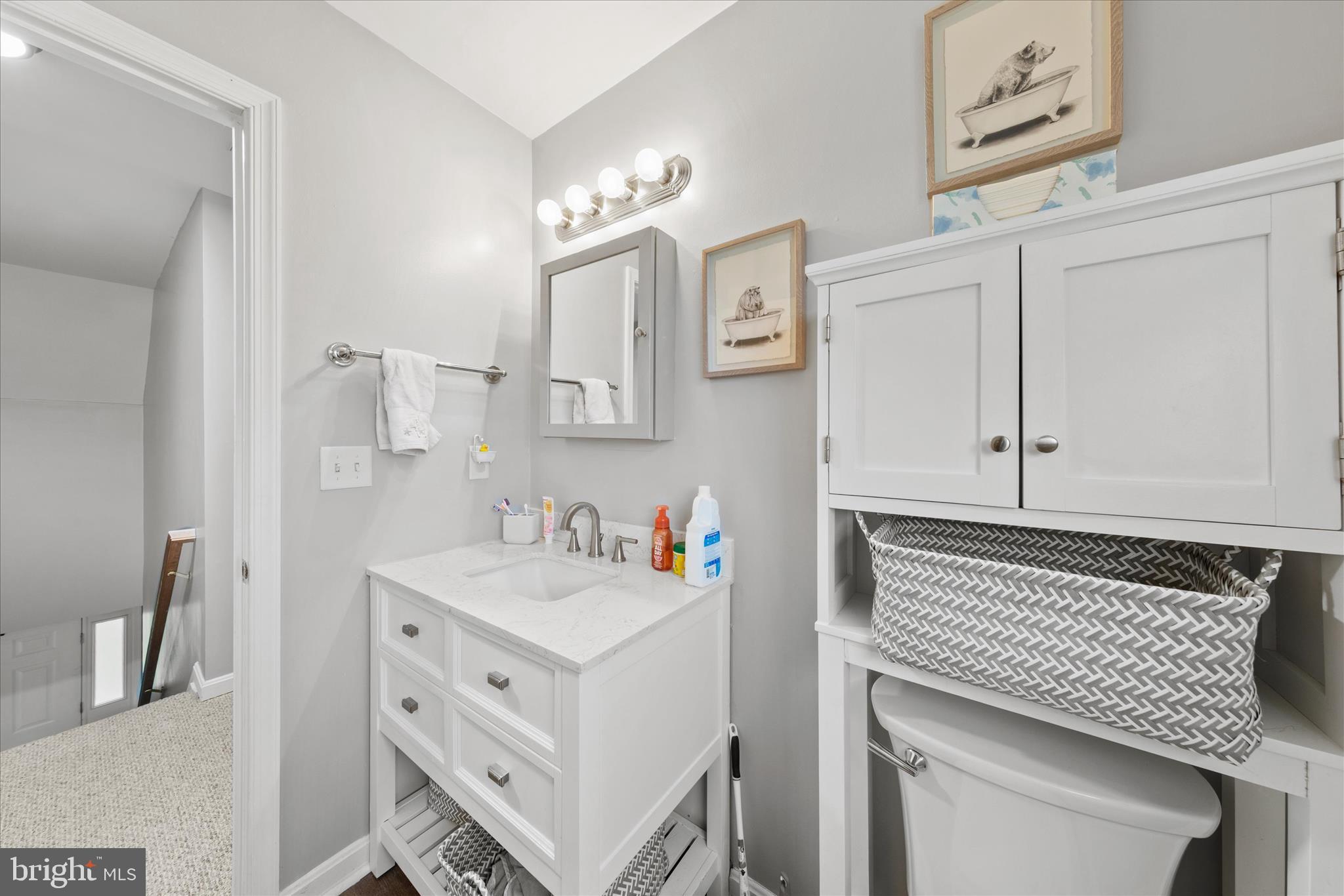 1807 Price Station Road Church Hill, MD 21623 - Photo 28 of 48 a bathroom with a sink a vanity and a mirror
