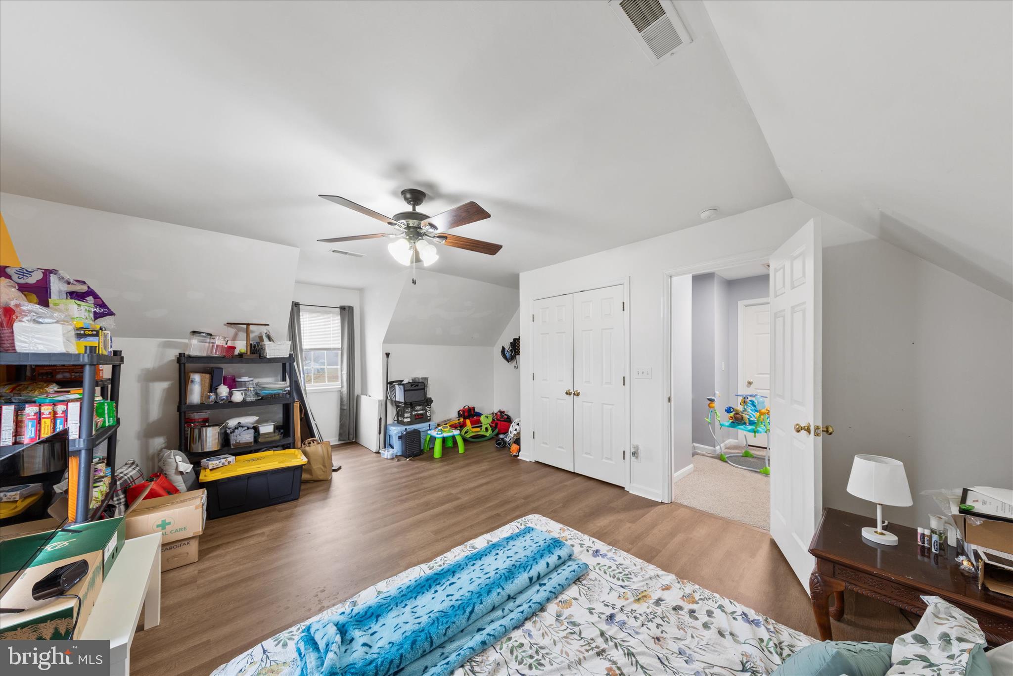 1807 Price Station Road Church Hill, MD 21623 - Photo 30 of 48 a bedroom with bed and a bookshelf