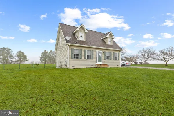 a view of a house with a big yard