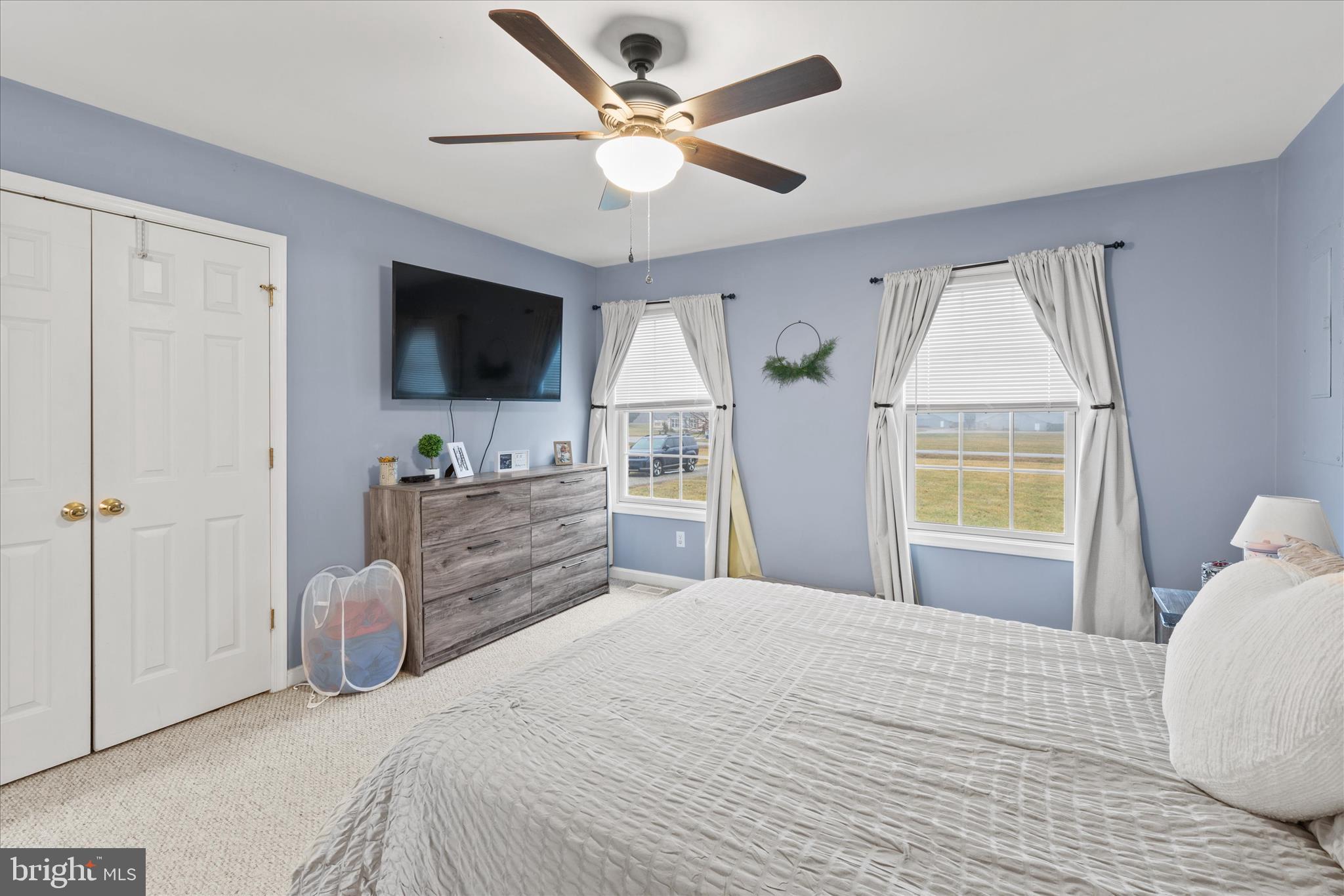 1807 Price Station Road Church Hill, MD 21623 - Photo 34 of 48 a bedroom with a large bed and a flat screen tv