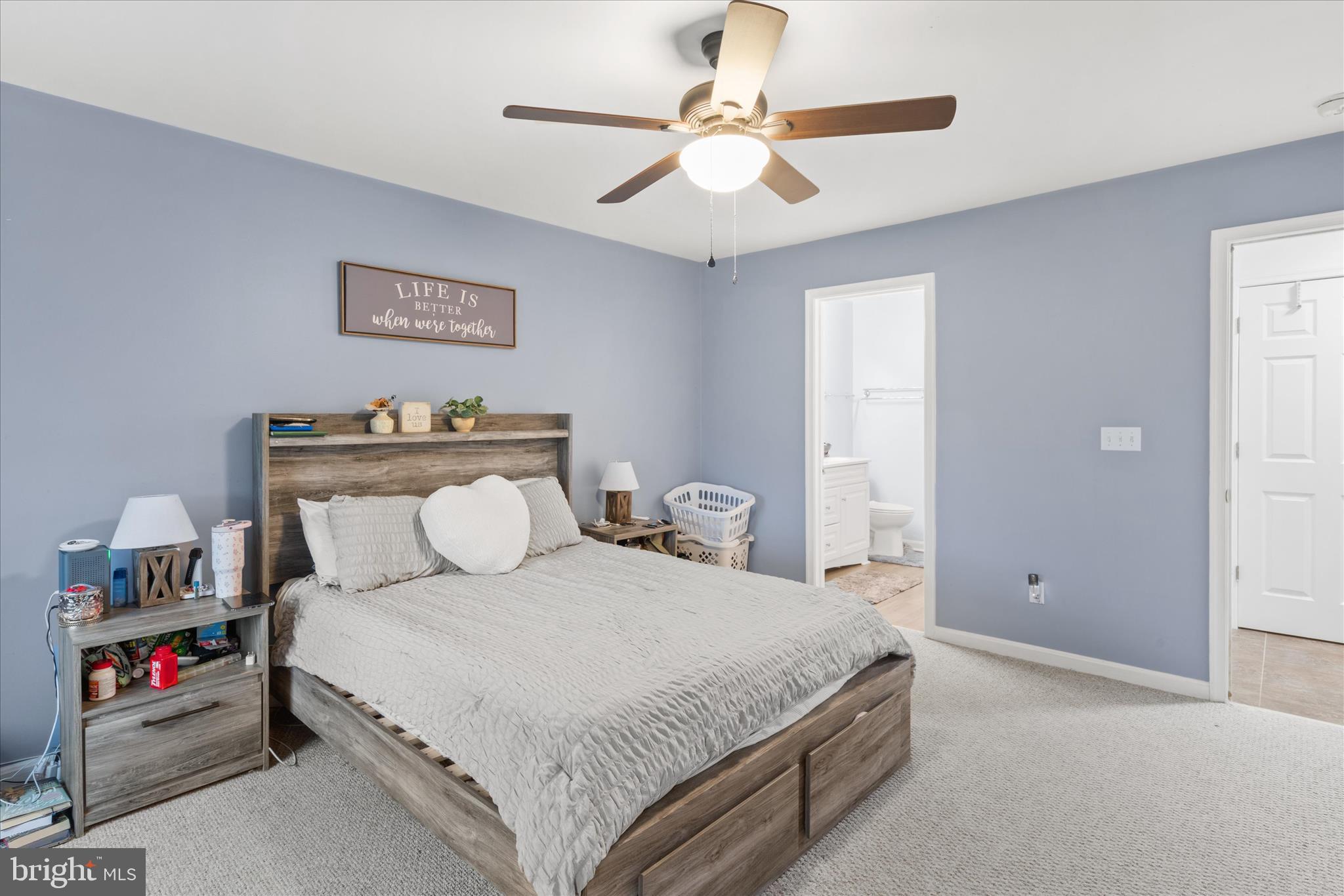 1807 Price Station Road Church Hill, MD 21623 - Photo 35 of 48 a bedroom with a large bed and a chandelier