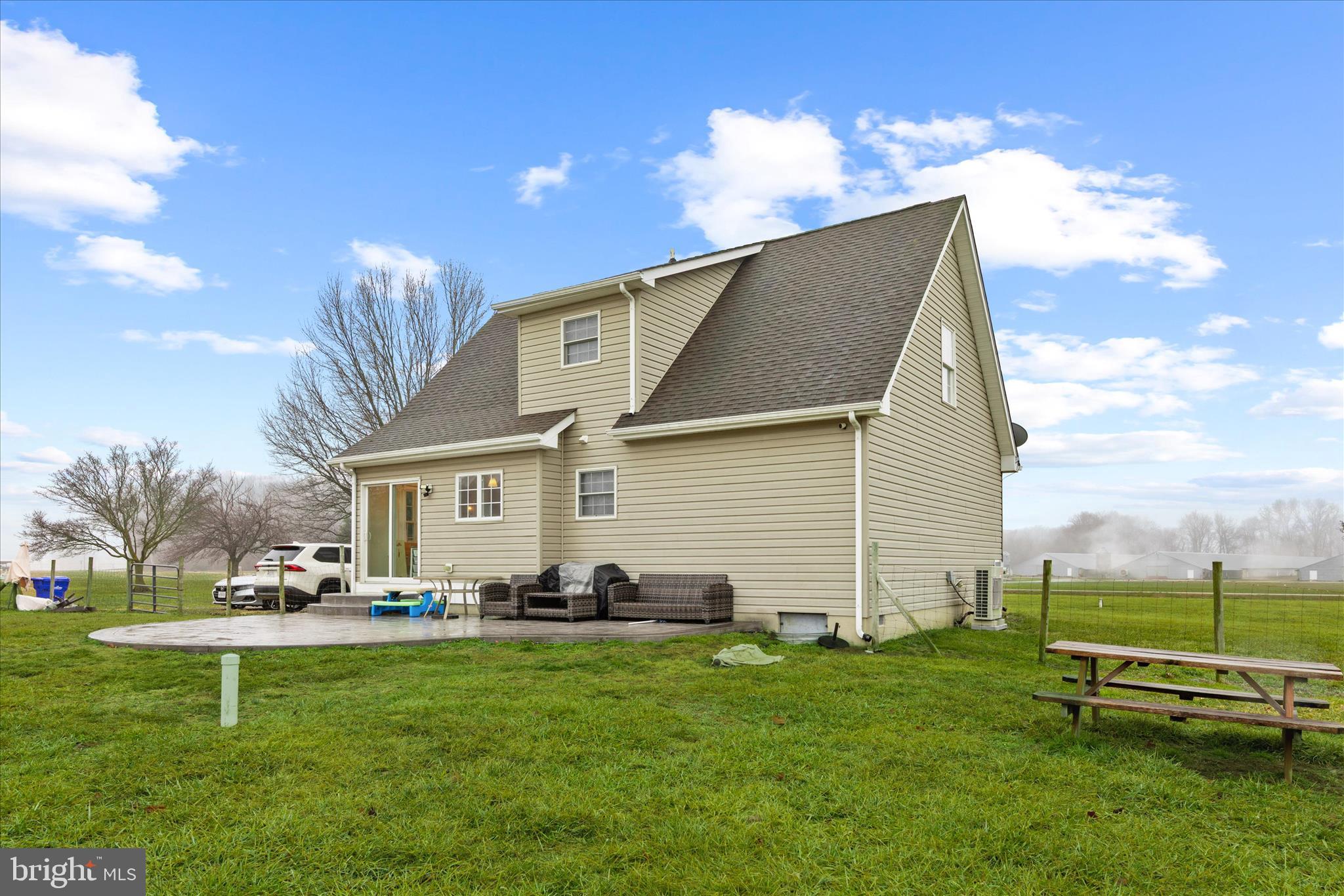 1807 Price Station Road Church Hill, MD 21623 - Photo 46 of 48 a front view of house with yard and outdoor seating