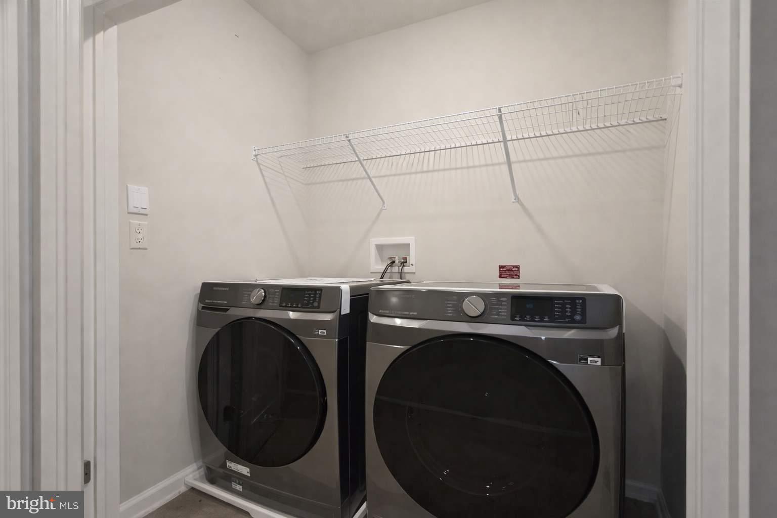 8706 Cherrybark Road Clinton, MD 20735 - Photo 15 of 21 a utility room with dryer and washer