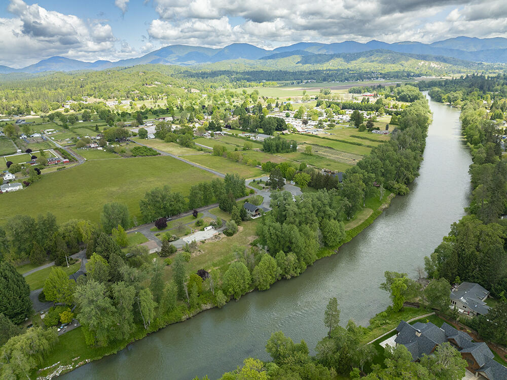 0 Lower River Road, Unit TL#108 Grants Pass, OR 97526 - Photo 43 of 47 a view of a lake with a city