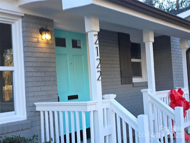 a view of a porch of a house