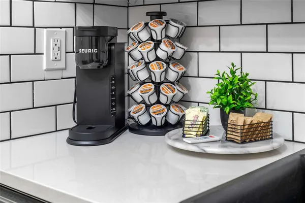 a view of a vase of flowers sitting on a table