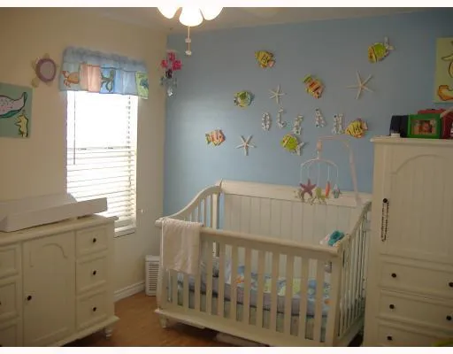 a bathroom with a bathtub and a window