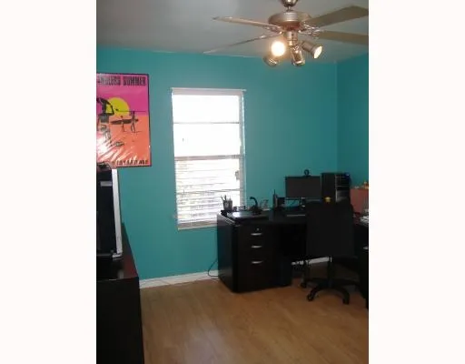 a workspace with furniture and window