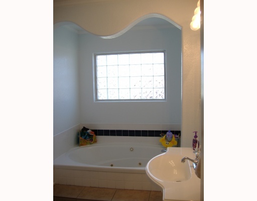 3722 Laguna Shores Road Corpus Christi, TX 78418 - Photo 7 of 8 a bathroom with a sink and bathtub