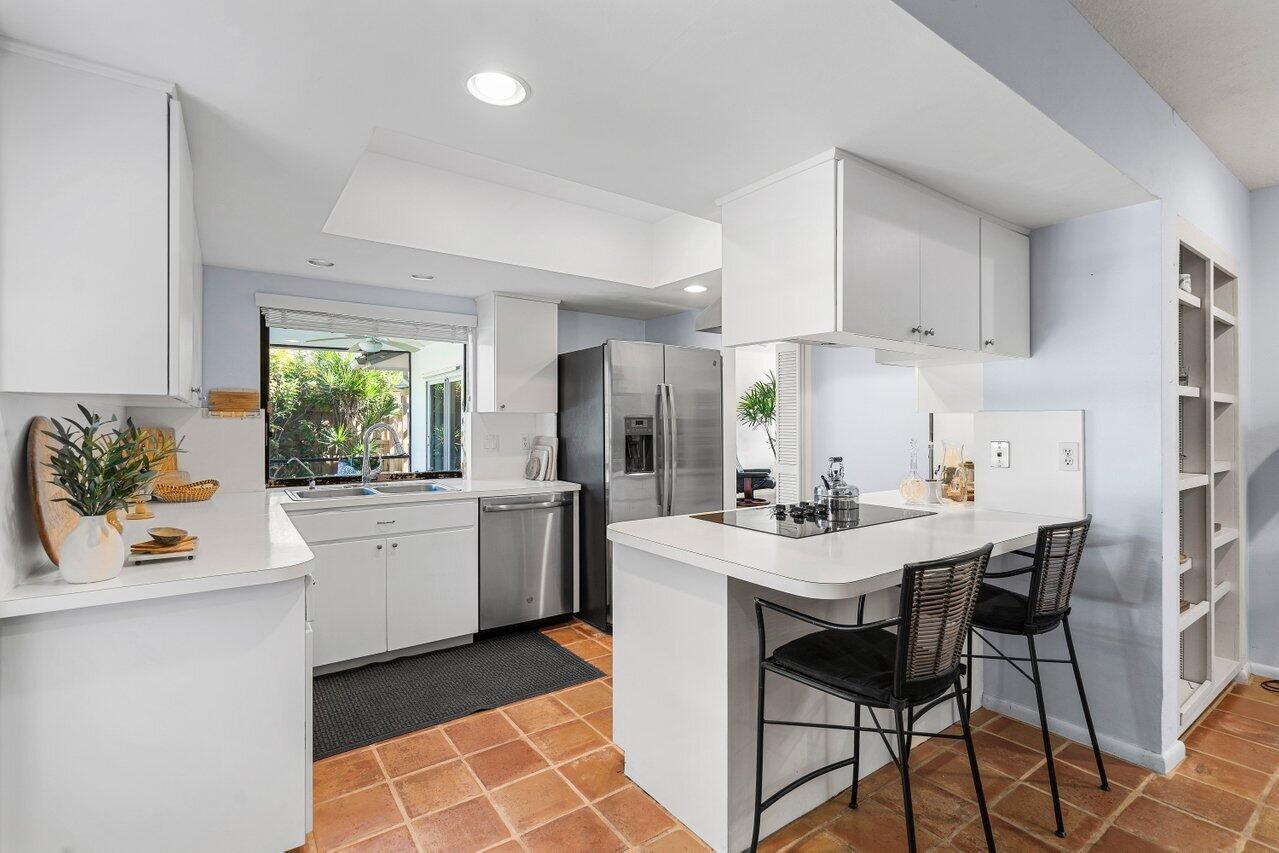 755 Sevilla Drive Boca Raton, FL 33432 - Photo 10 of 16 Kitchen is always center of home