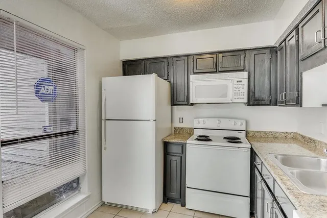 a utility room with washer and dryer