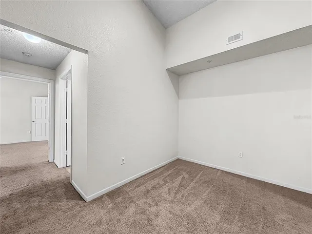 a bathroom with a sink toilet and a mirror