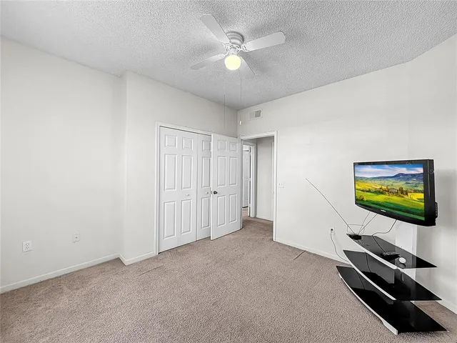 a view of a house with sitting area and furniture