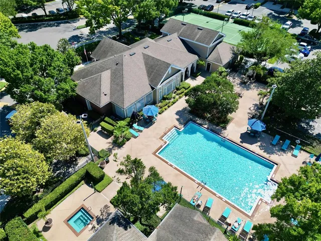 an aerial view of a house with outdoor space