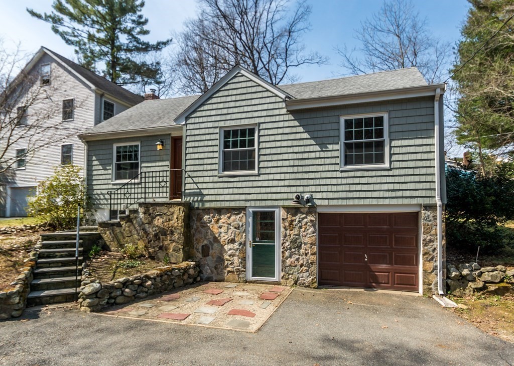 11 Whittier Rd Extension Natick, MA 01760 - Photo 1 of 19 a front view of a house with a yard