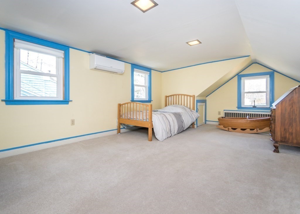 11 Whittier Rd Extension Natick, MA 01760 - Photo 13 of 19 a living room with furniture and a window