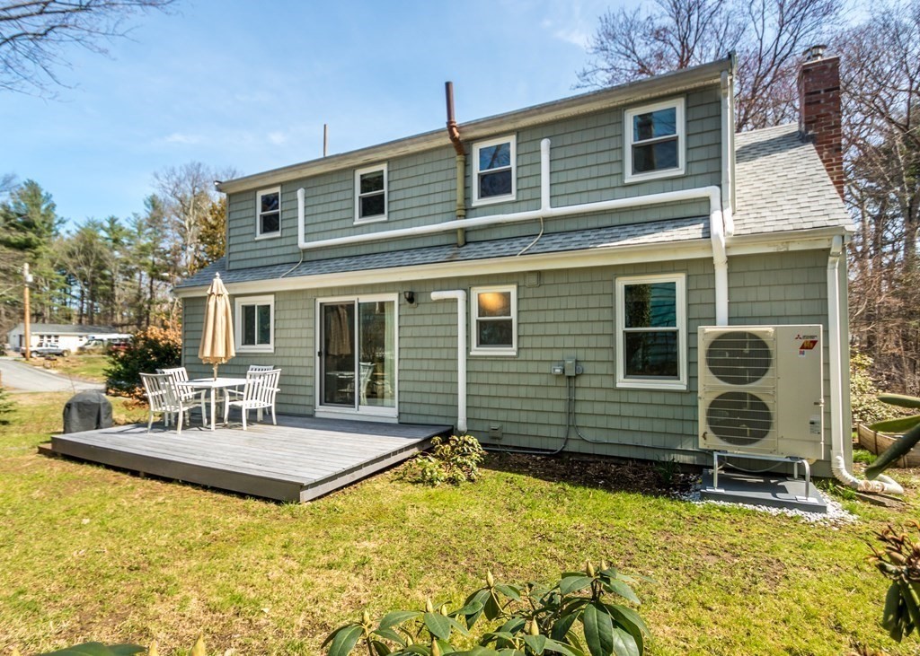 11 Whittier Rd Extension Natick, MA 01760 - Photo 18 of 19 a view of a house with backyard porch and furniture