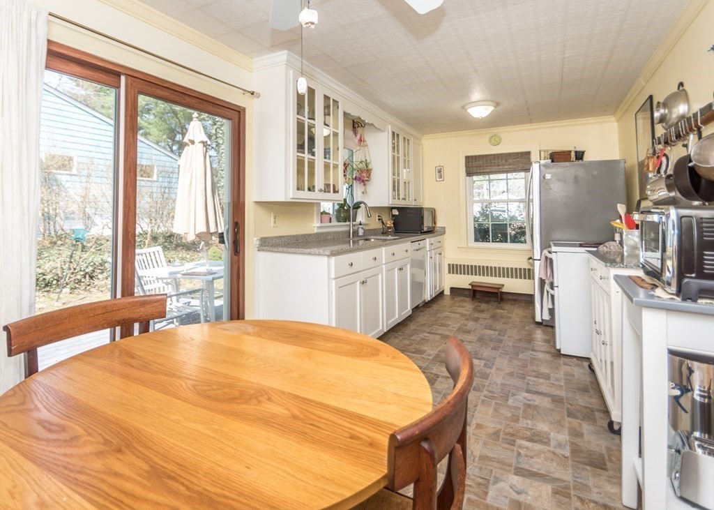 11 Whittier Rd Extension Natick, MA 01760 - Photo 5 of 19 a large white kitchen with a large window
