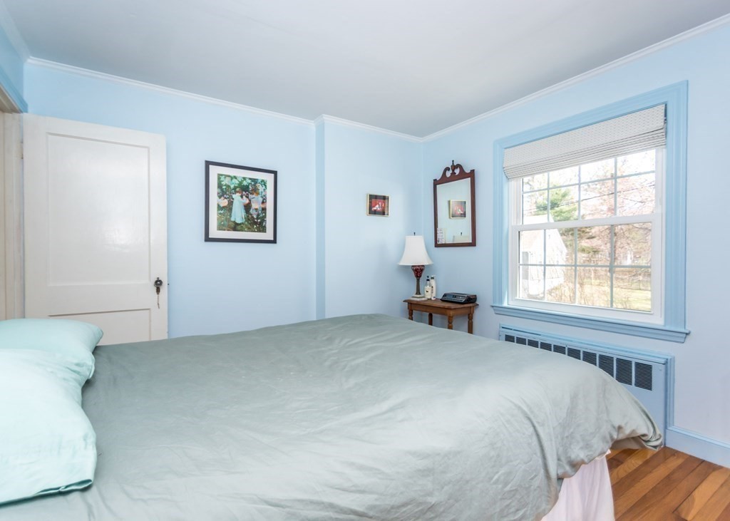 11 Whittier Rd Extension Natick, MA 01760 - Photo 9 of 19 a bed room with a bed and a window