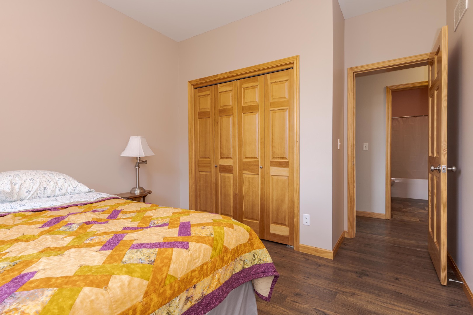 22037 East 2600 N Road Odell, IL 60460 - Photo 24 of 59 a bedroom with a bed and a lamp
