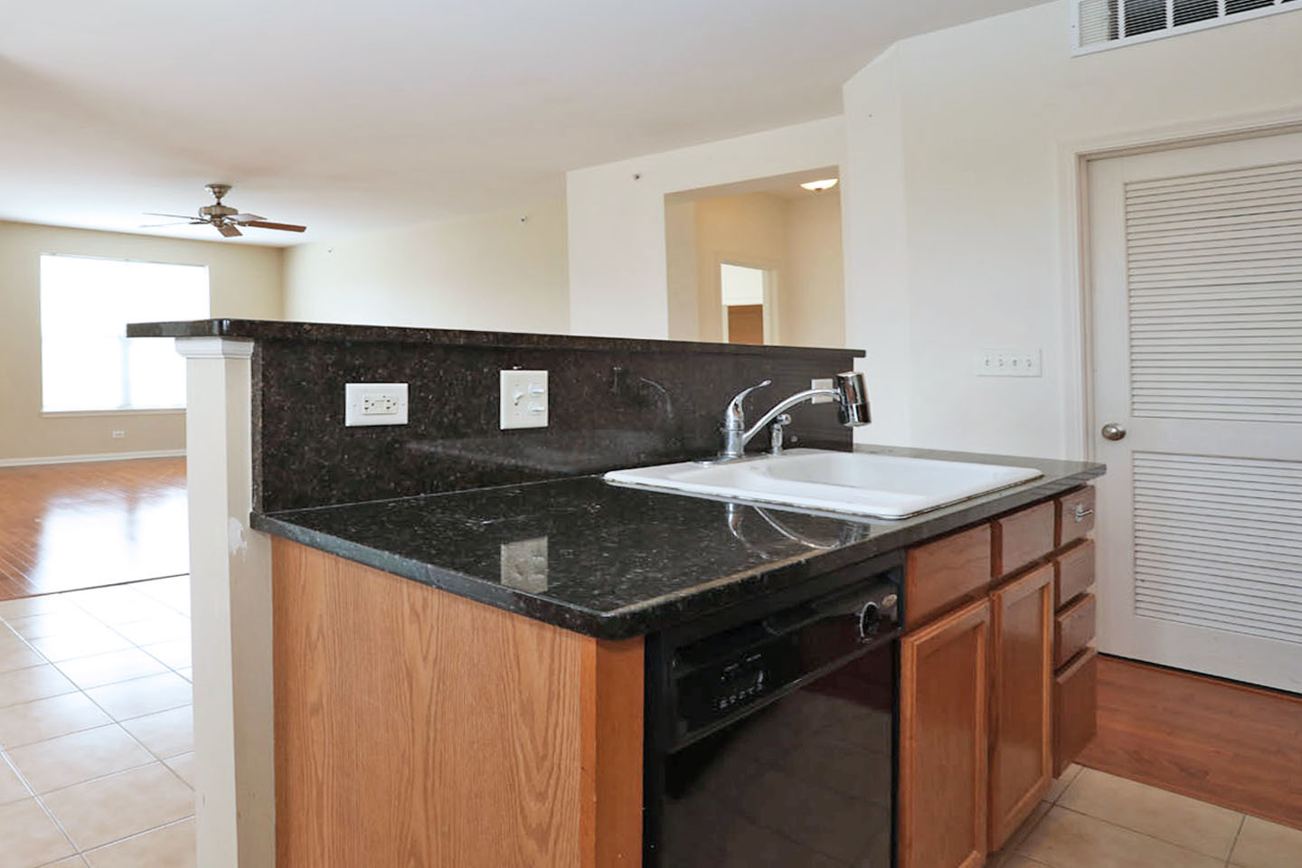1359 Scarboro Road Schaumburg, IL 60193 - Photo 13 of 21 a kitchen with a sink and a refrigerator