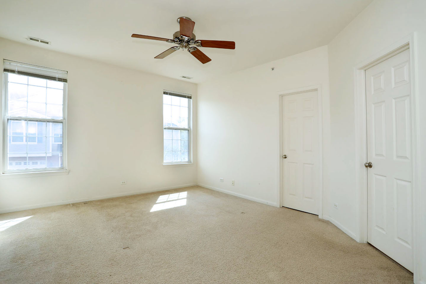 1359 Scarboro Road Schaumburg, IL 60193 - Photo 15 of 21 a view of room with a ceiling fan and window