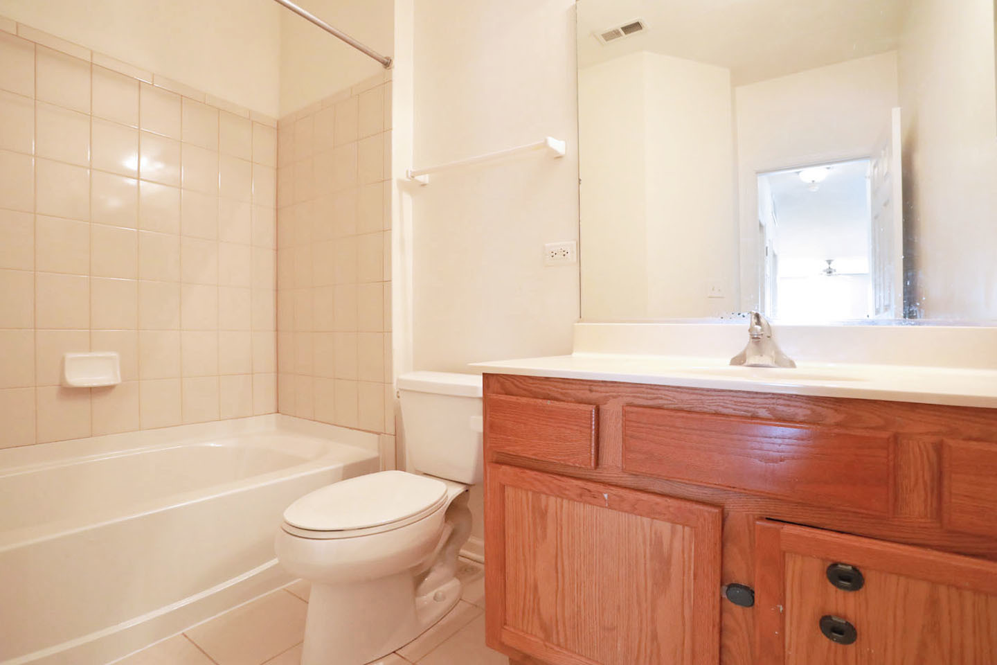 1359 Scarboro Road Schaumburg, IL 60193 - Photo 19 of 21 a bathroom with a sink a toilet and shower