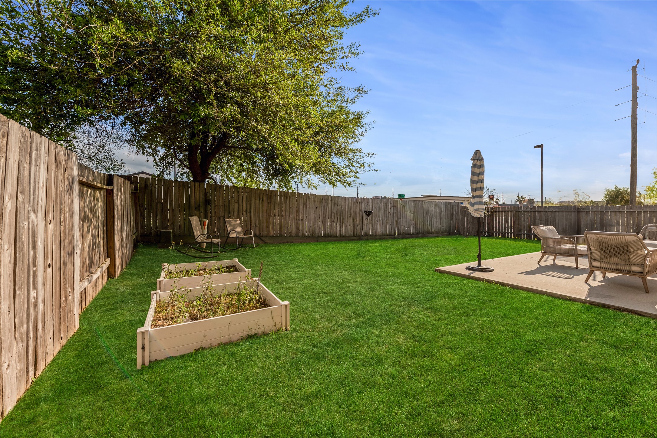 702 Aulia Lane Spring, TX 77386 - Photo 33 of 37 a view of a backyard with a garden