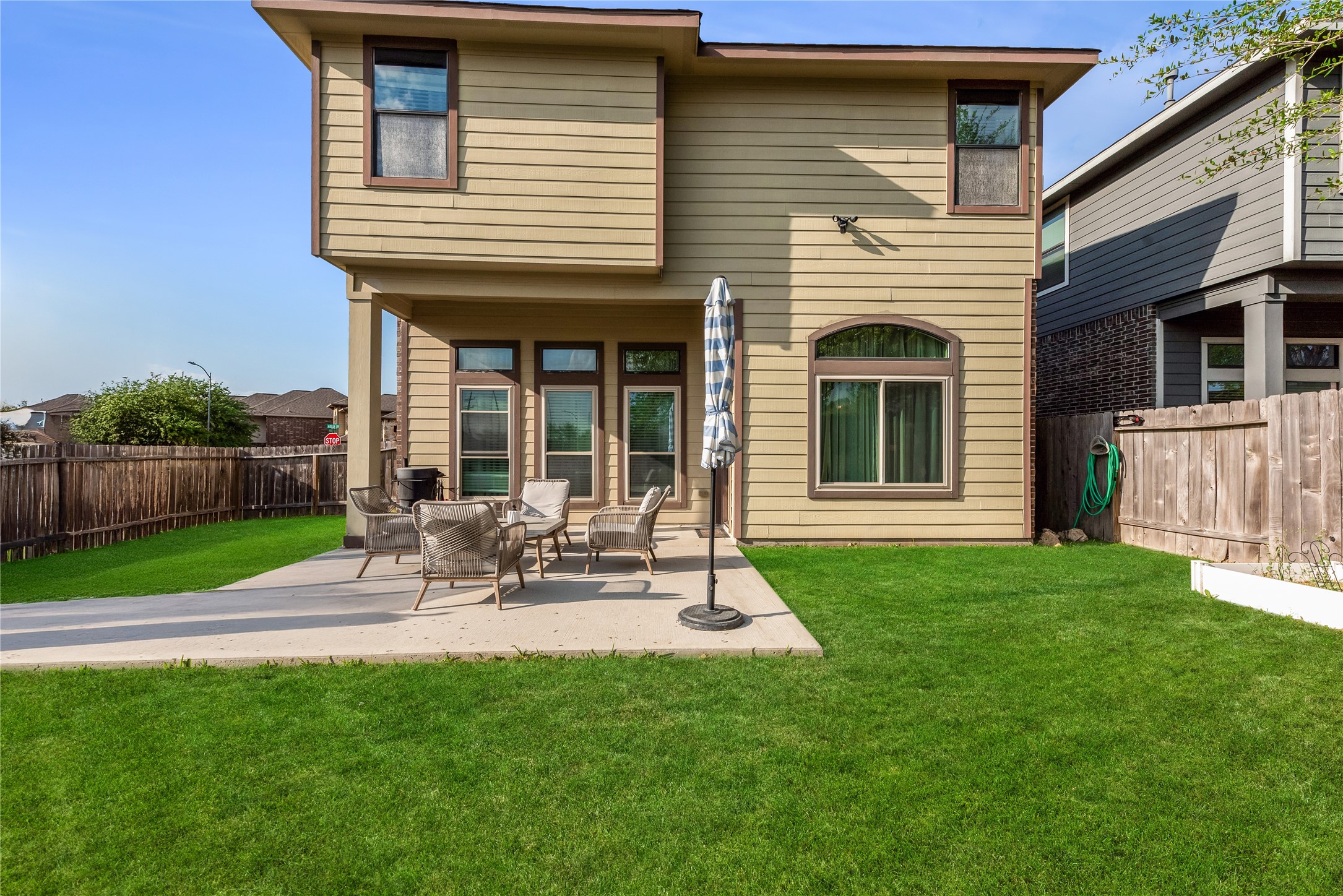 702 Aulia Lane Spring, TX 77386 - Photo 34 of 37 a view of a house with a yard and sitting area