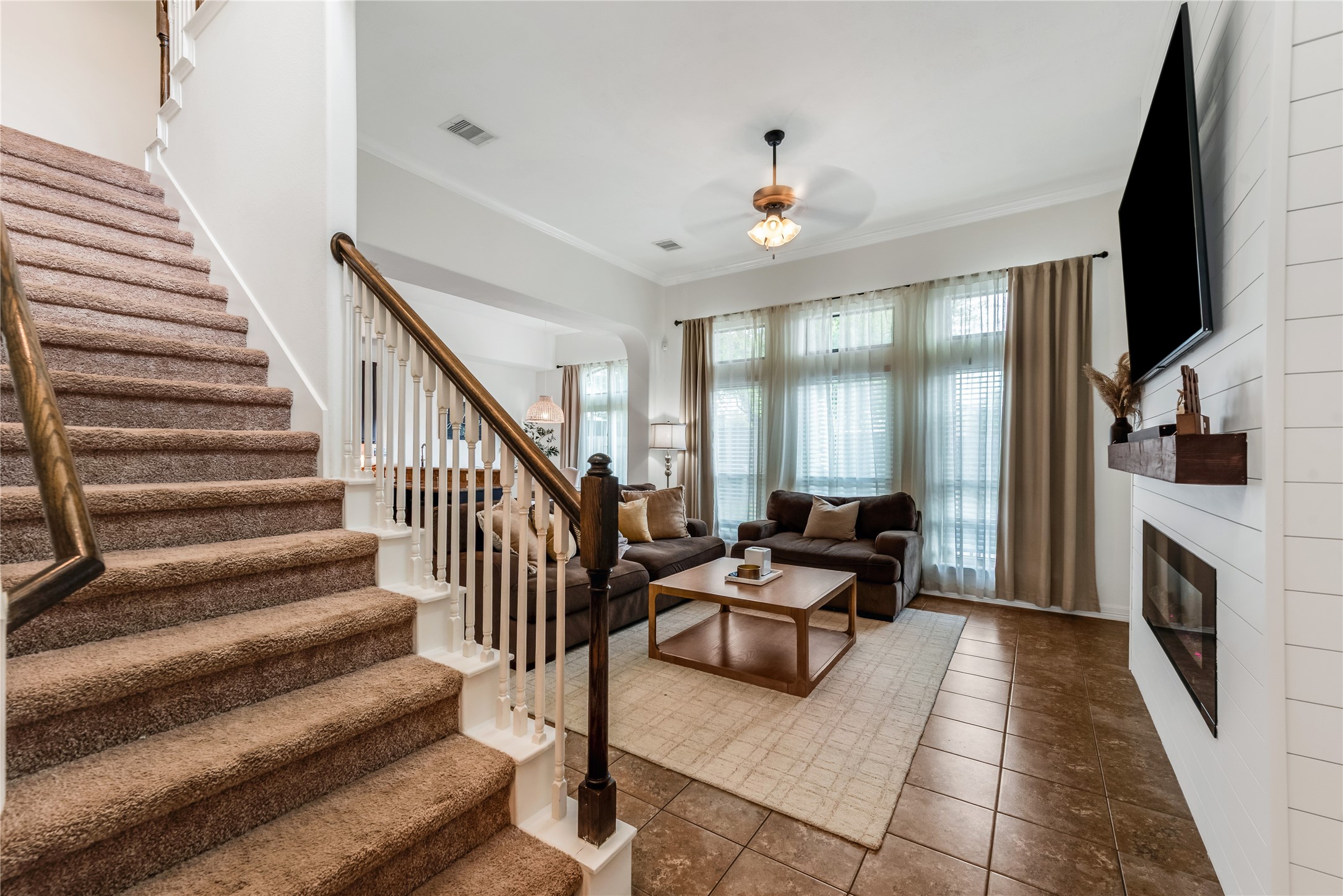 702 Aulia Lane Spring, TX 77386 - Photo 6 of 37 a living room with furniture fireplace and flat screen tv
