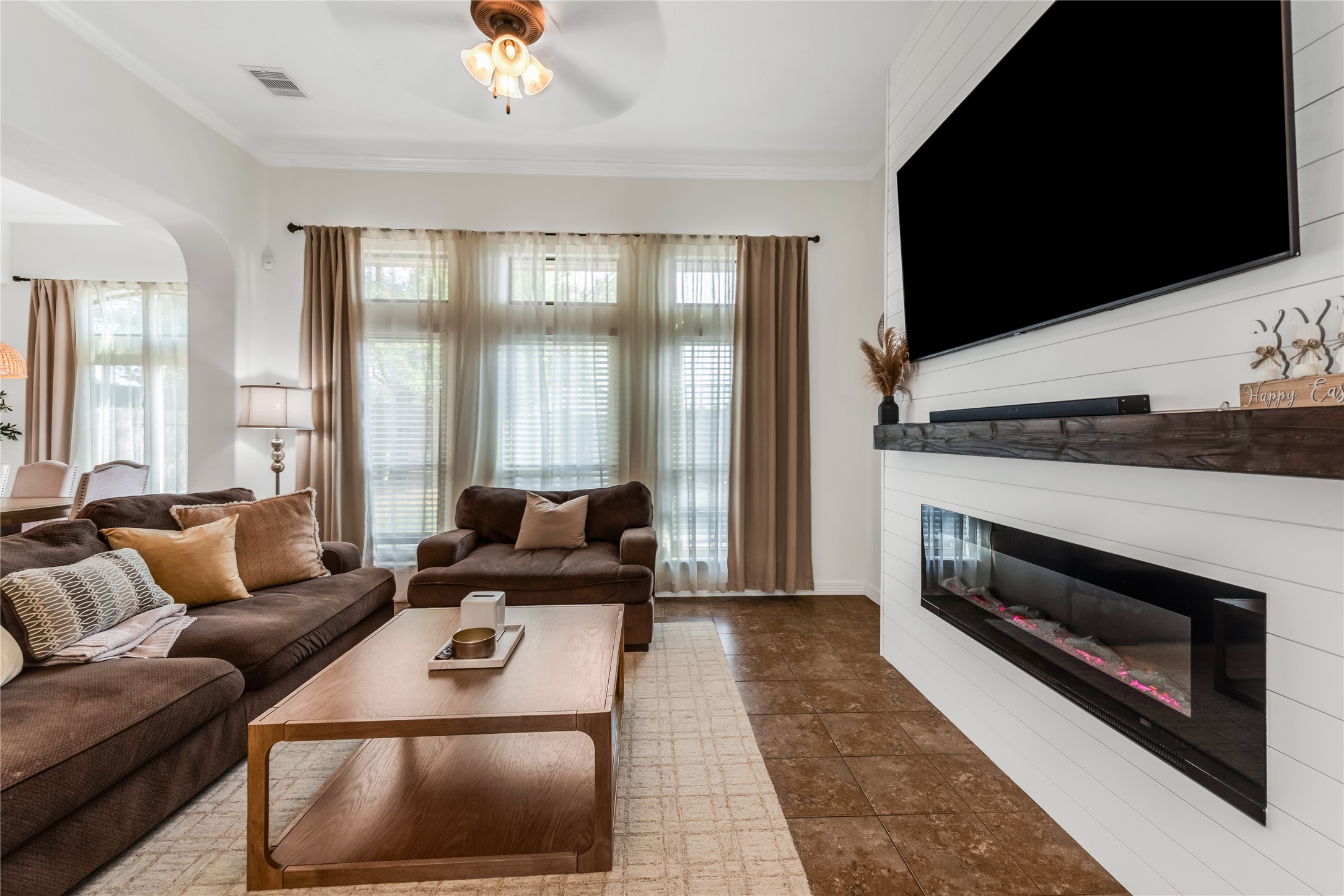 702 Aulia Lane Spring, TX 77386 - Photo 9 of 37 a living room with furniture and a fireplace