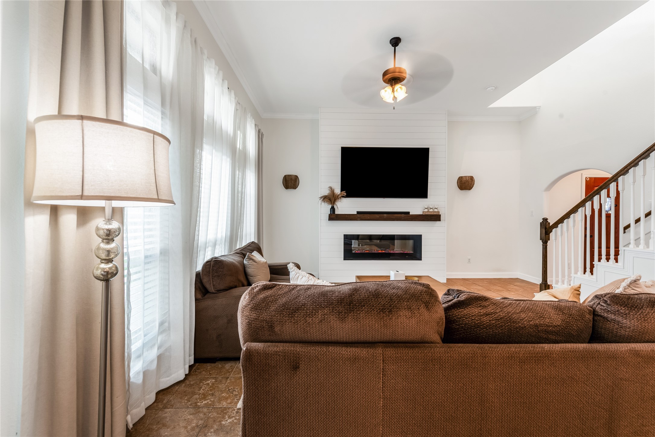 702 Aulia Lane Spring, TX 77386 - Photo 10 of 37 a living room with furniture and a flat screen tv
