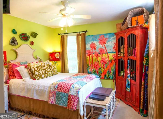 a view of a porch with furniture and garden