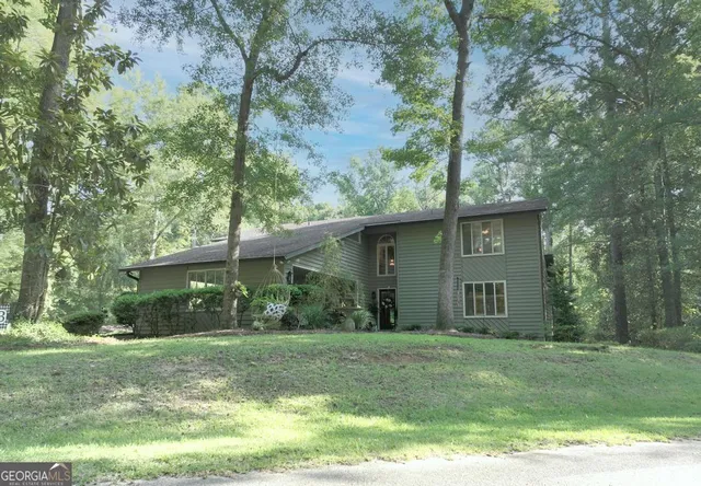 a living room filled with furniture and a fireplace