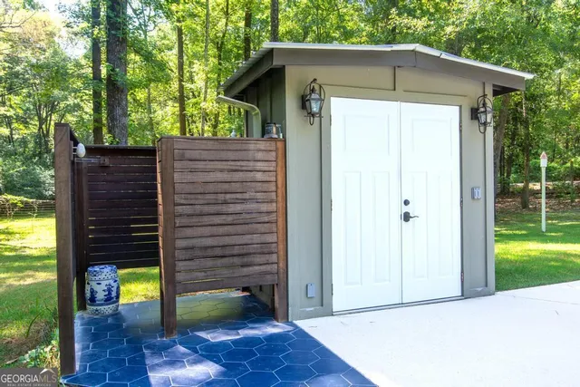 a view of a park with large trees